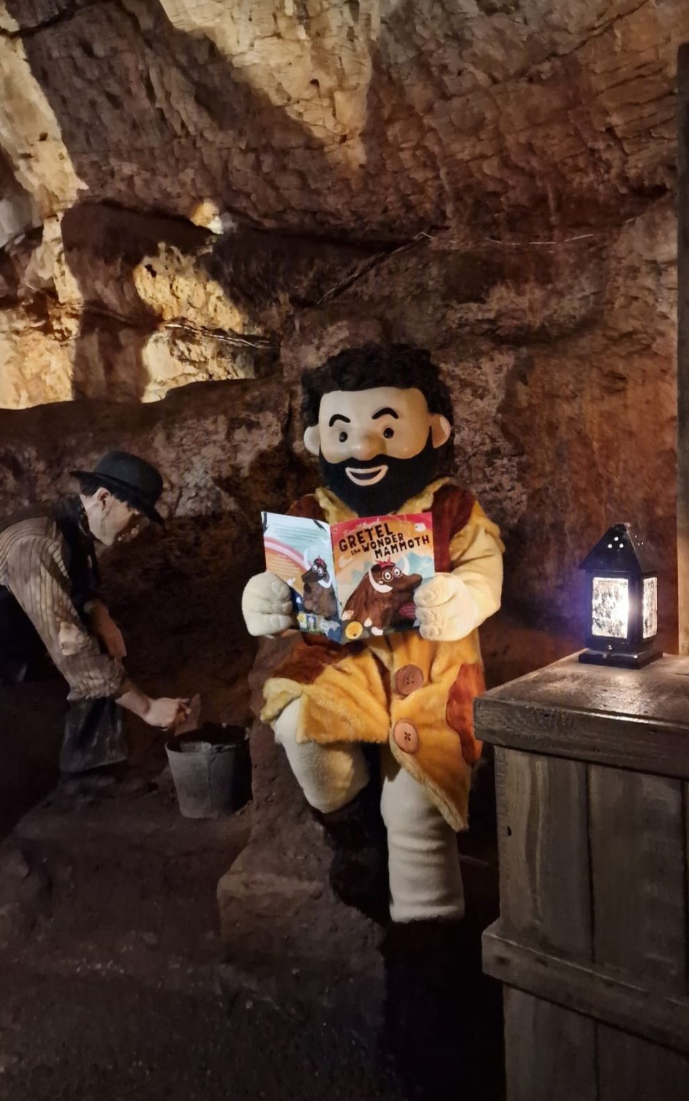 Cavog reading a book | Kents Cavern, Torquay