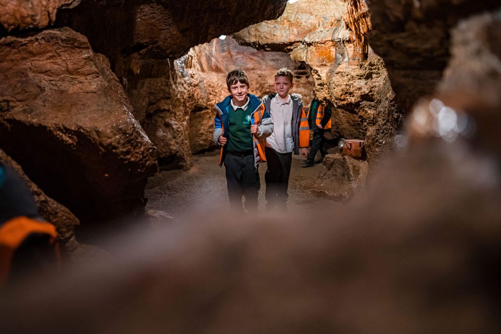 Children exploring the cave | Kents Cavern, Devon
